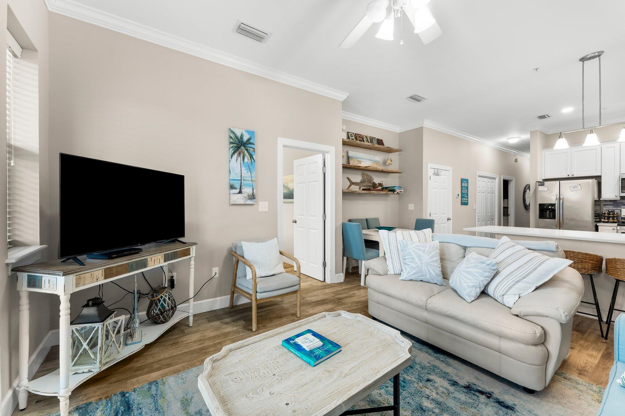 231 Somerset Bridge Road, Unit 2209 Santa Rosa Beach, FL 32459 - Photo 3 of 30 a living room with furniture and a flat screen tv