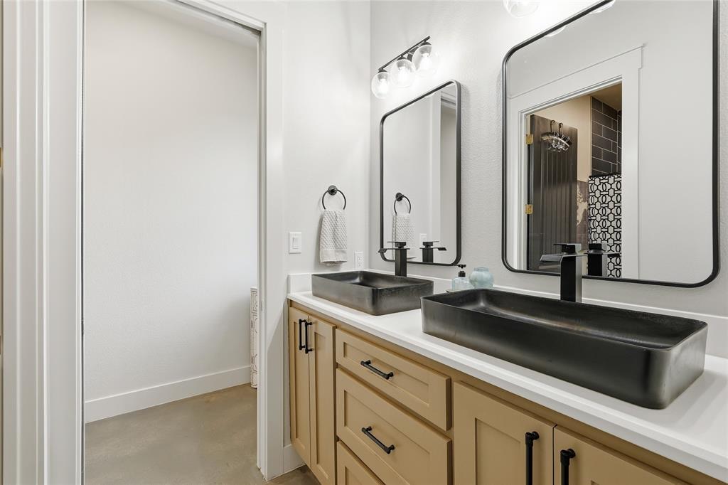 3988 Lake Valley Road Sunset, TX 76270 - Photo 24 of 39 a close view of sink and mirror