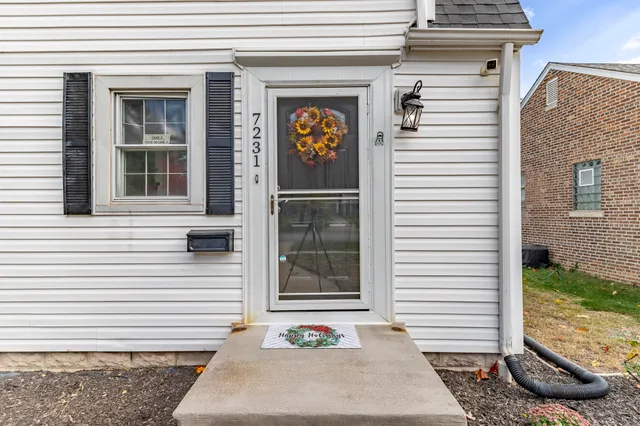 a front view of a house with parking