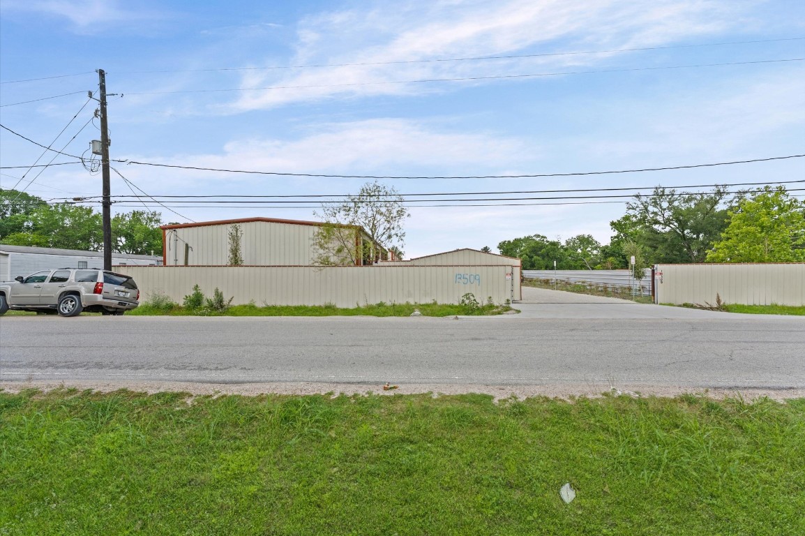 a street with a road sign on the side of it