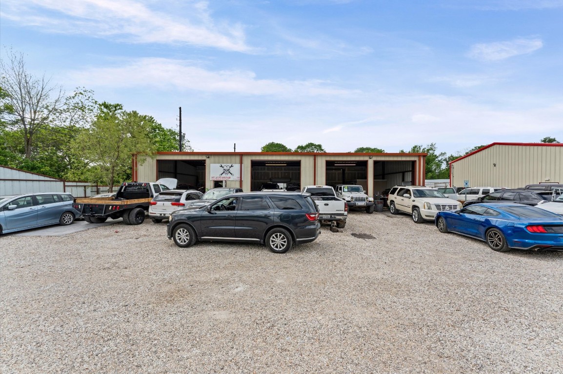 13509 Kaltenbrun Road Houston, TX 77086 - Photo 5 of 17 a view of cars parked in a parking lot