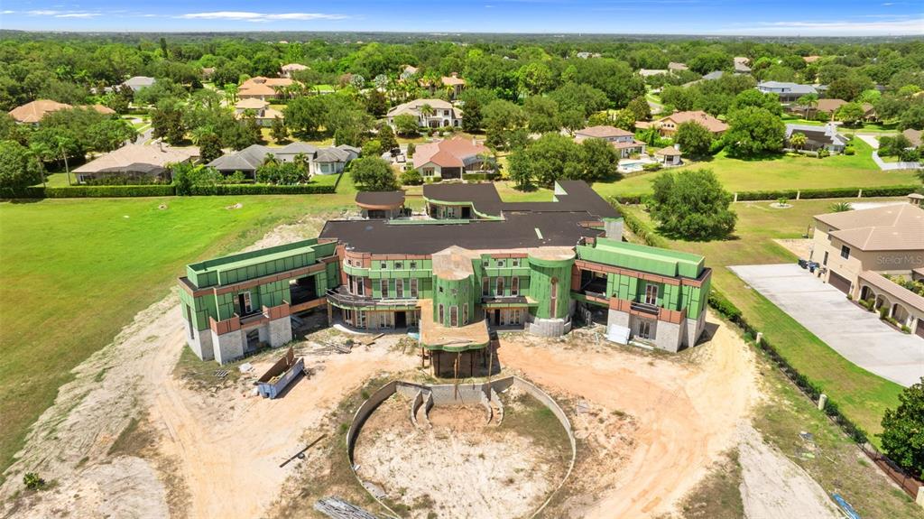 9621 Windy Ridge Road Windermere, FL 34786 - Photo 13 of 28 an outdoor space with furniture and garden