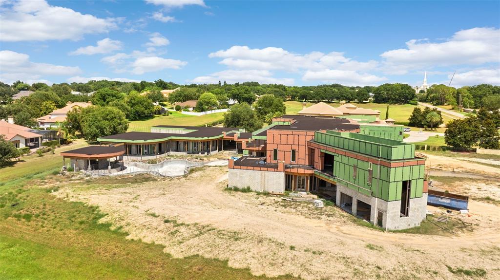 9621 Windy Ridge Road Windermere, FL 34786 - Photo 15 of 28 a view of a lake with houses