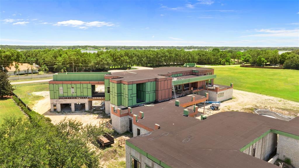 9621 Windy Ridge Road Windermere, FL 34786 - Photo 16 of 28 a terrace with outdoor seating and city view