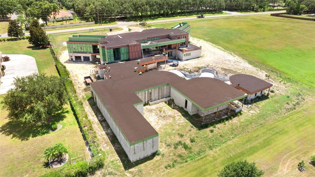 9621 Windy Ridge Road Windermere, FL 34786 - Photo 17 of 28 a view of a swimming pool with lounge chair