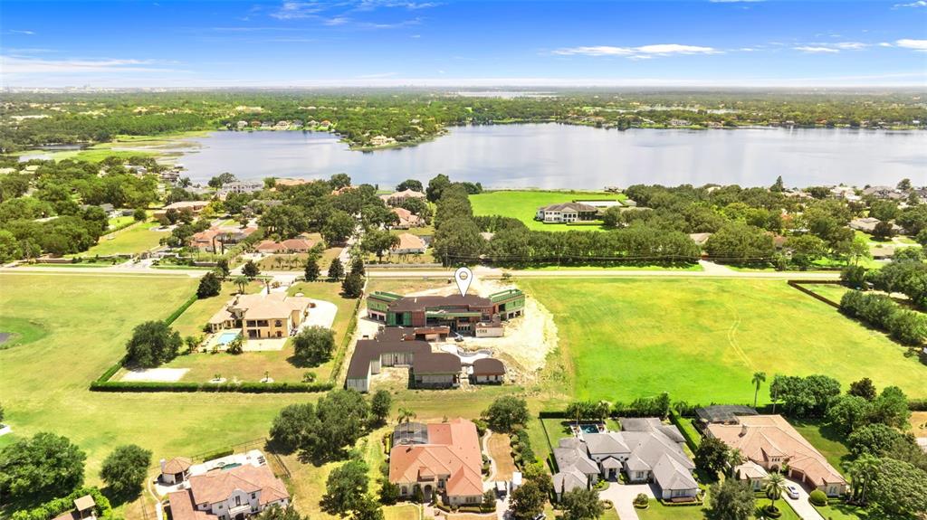 9621 Windy Ridge Road Windermere, FL 34786 - Photo 19 of 28 a view of a city with an ocean view