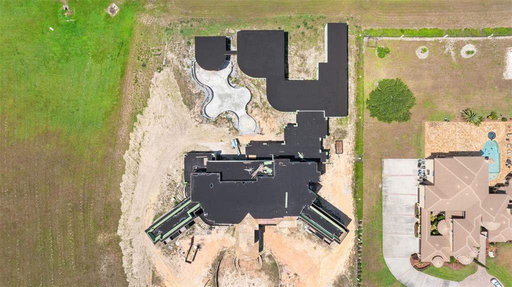 9621 Windy Ridge Road Windermere, FL 34786 - Photo 2 of 28 an aerial view of a house with outdoor space