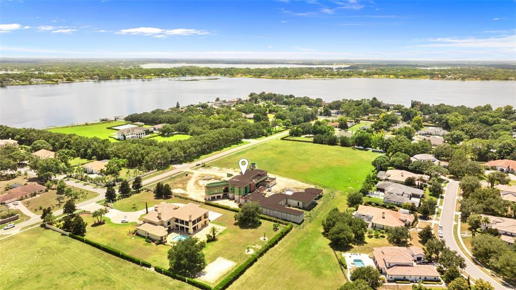 9621 Windy Ridge Road Windermere, FL 34786 - Photo 21 of 28 a view of a city and an ocean view