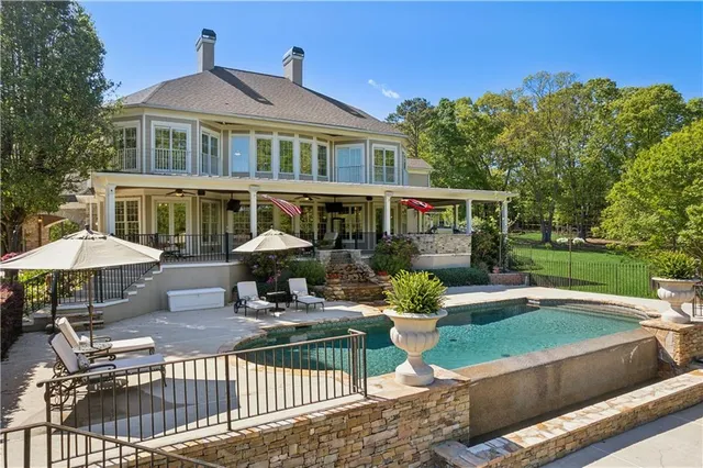 a room with furniture and a book shelf