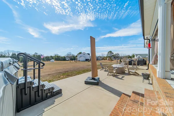 a swimming pool view with a lake view