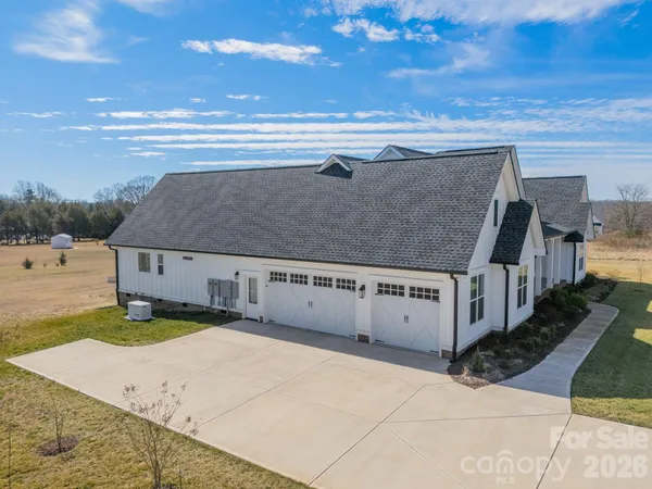 a view of a town with mountains in the background