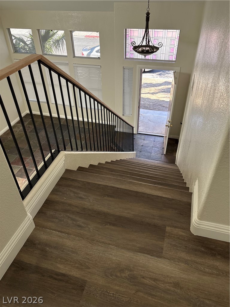 2670 Ridgewater Circle Henderson, NV 89074 - Photo 12 of 22 Ascend to comfort with these elegant hardwood stairs, bathed in natural light.
