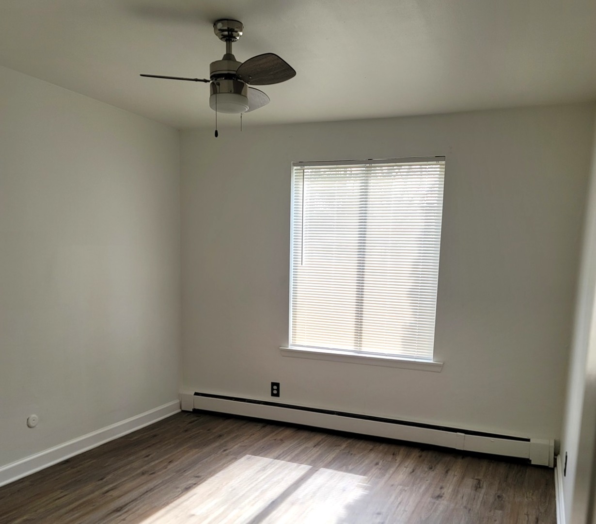 2700 Light Road, Unit 110 Oswego, IL 60543 - Photo 12 of 12 an empty room with a window