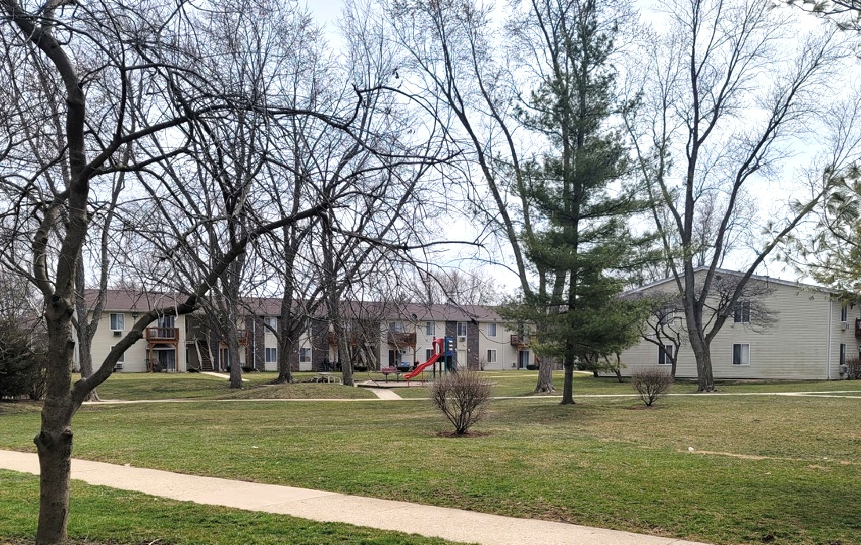2700 Light Road, Unit 110 Oswego, IL 60543 - Photo 7 of 12 a view of large trees with a big yard and large trees