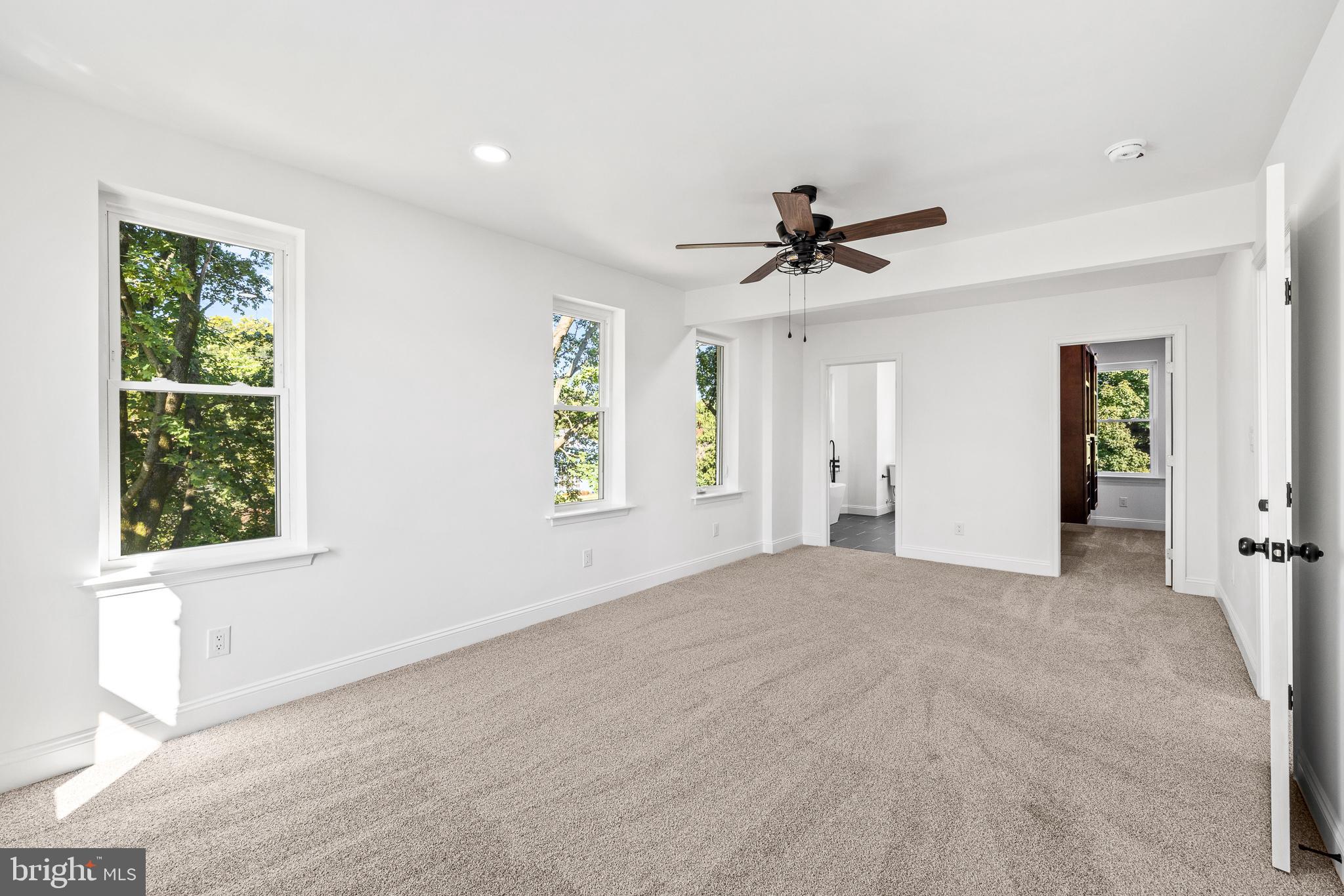 2055 Allentown Road Hatfield, PA 19440 - Photo 17 of 43 a view of n empty room with window and a ceiling fan