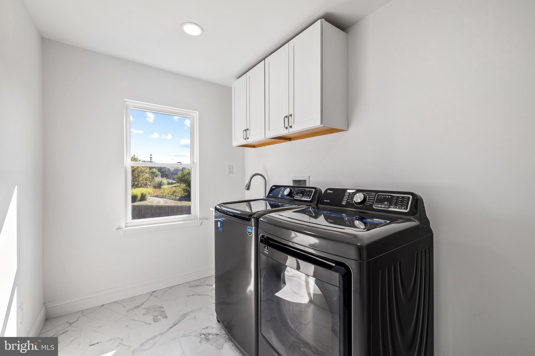 2055 Allentown Road Hatfield, PA 19440 - Photo 27 of 43 a white stove top oven sitting inside of a kitchen