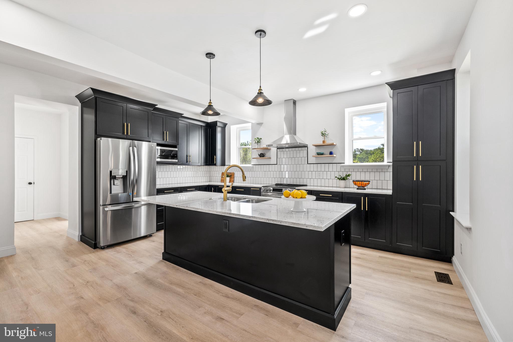 2055 Allentown Road Hatfield, PA 19440 - Photo 3 of 43 a kitchen with stainless steel appliances granite countertop a refrigerator a sink dishwasher a stove and a refrigerator