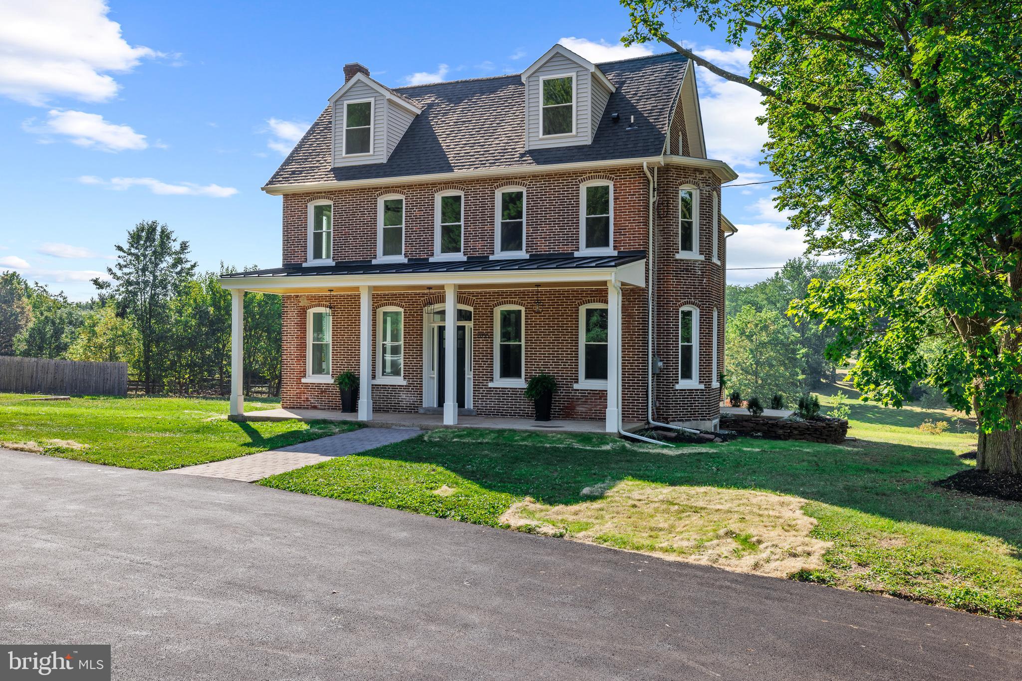 2055 Allentown Road Hatfield, PA 19440 - Photo 43 of 43 a front view of a house with a yard