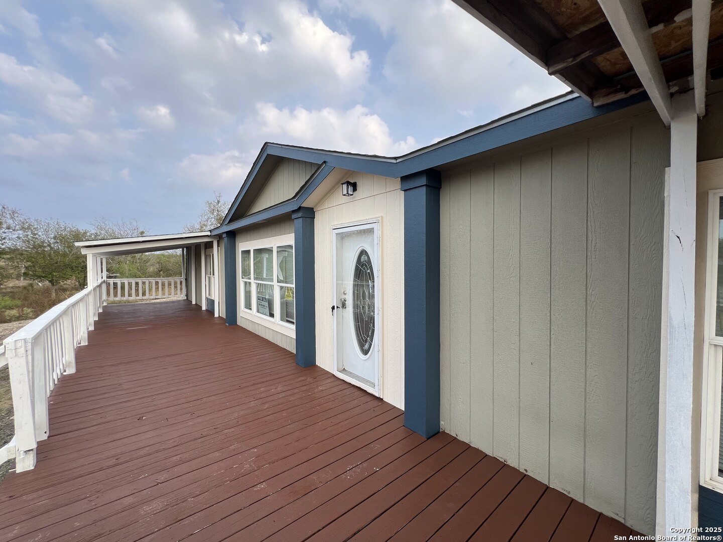a view of a house with roof deck