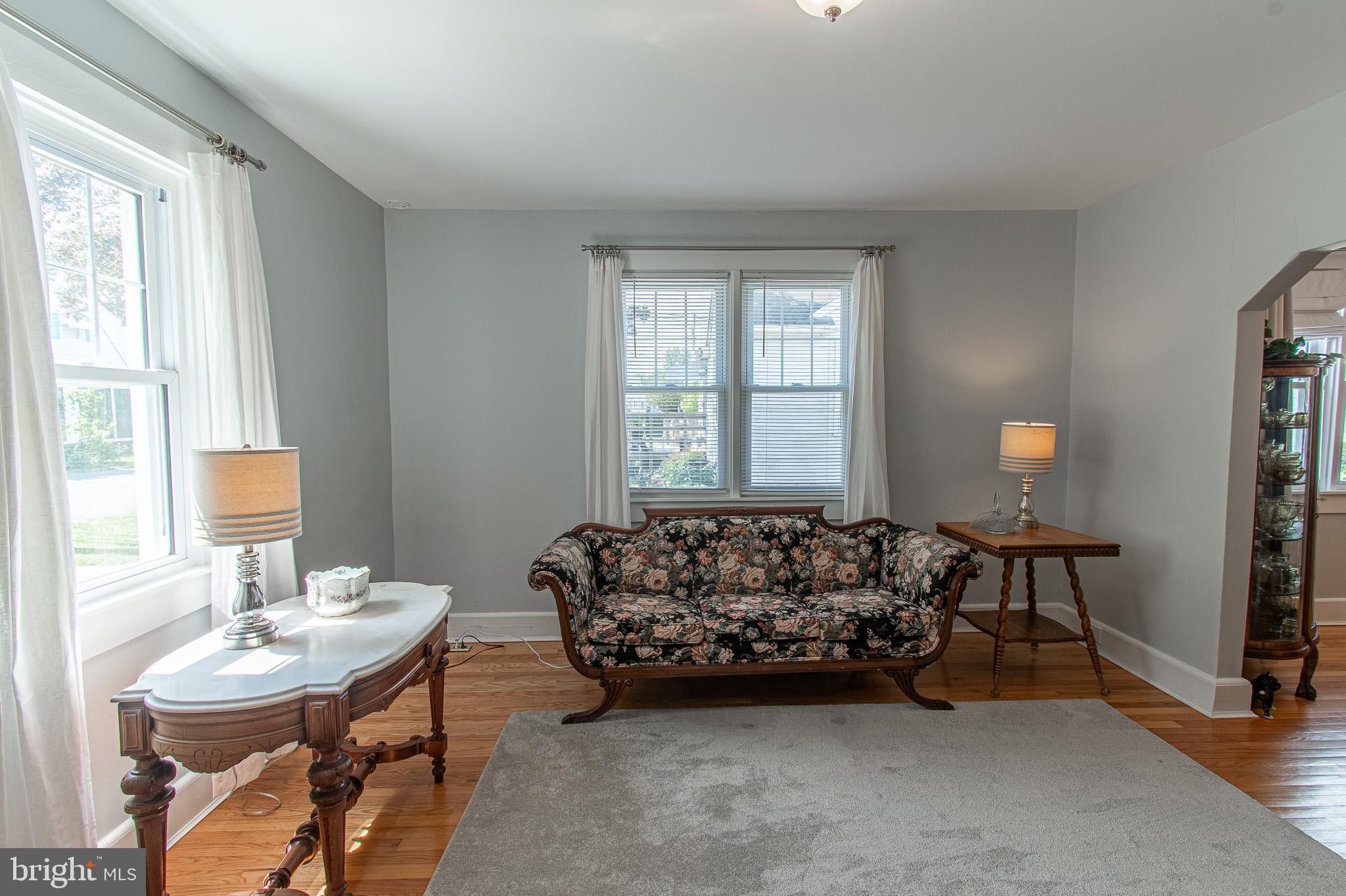 207 Crusader Road Cambridge, MD 21613 - Photo 14 of 76 a bed sitting in a bedroom next to a window