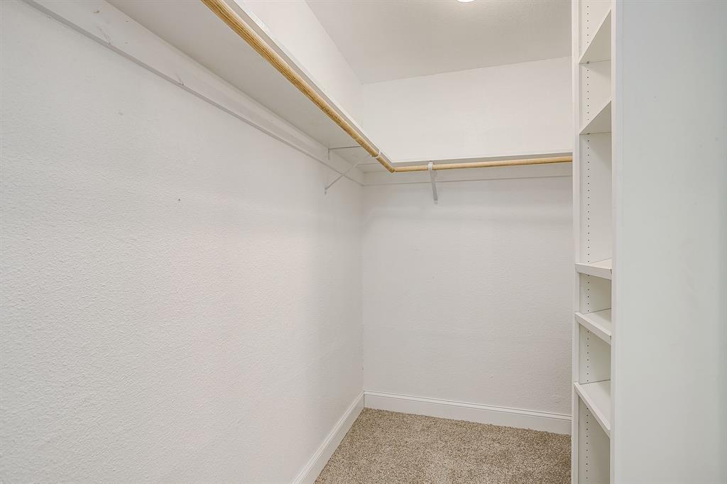 1003 Canton Road Cleburne, TX 76033 - Photo 25 of 40 a view of an empty walk in closet