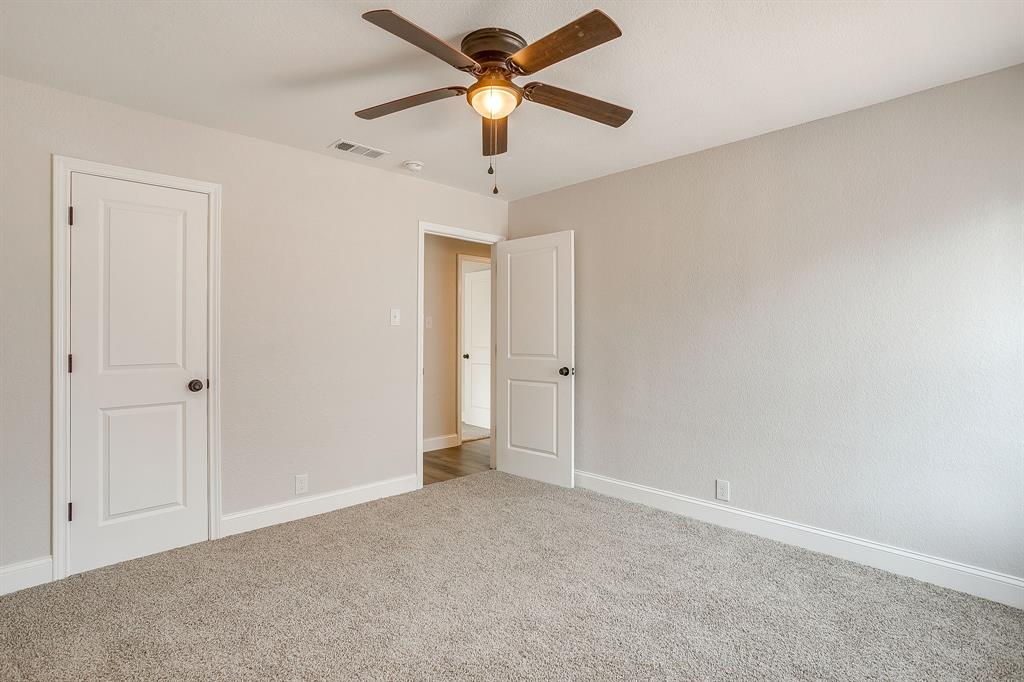 1003 Canton Road Cleburne, TX 76033 - Photo 27 of 40 a view of a room with a ceiling fan