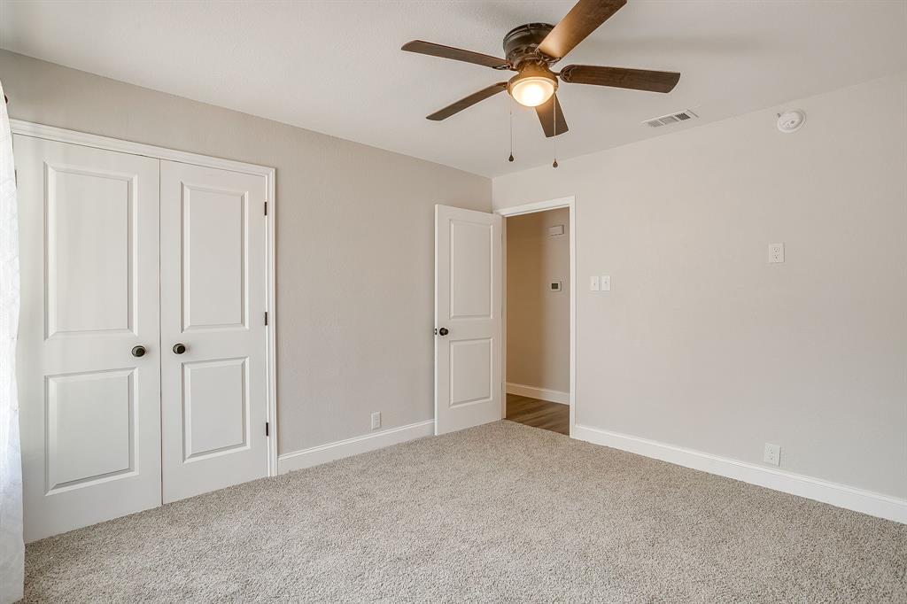 1003 Canton Road Cleburne, TX 76033 - Photo 30 of 40 a view of a big room with chandelier fan