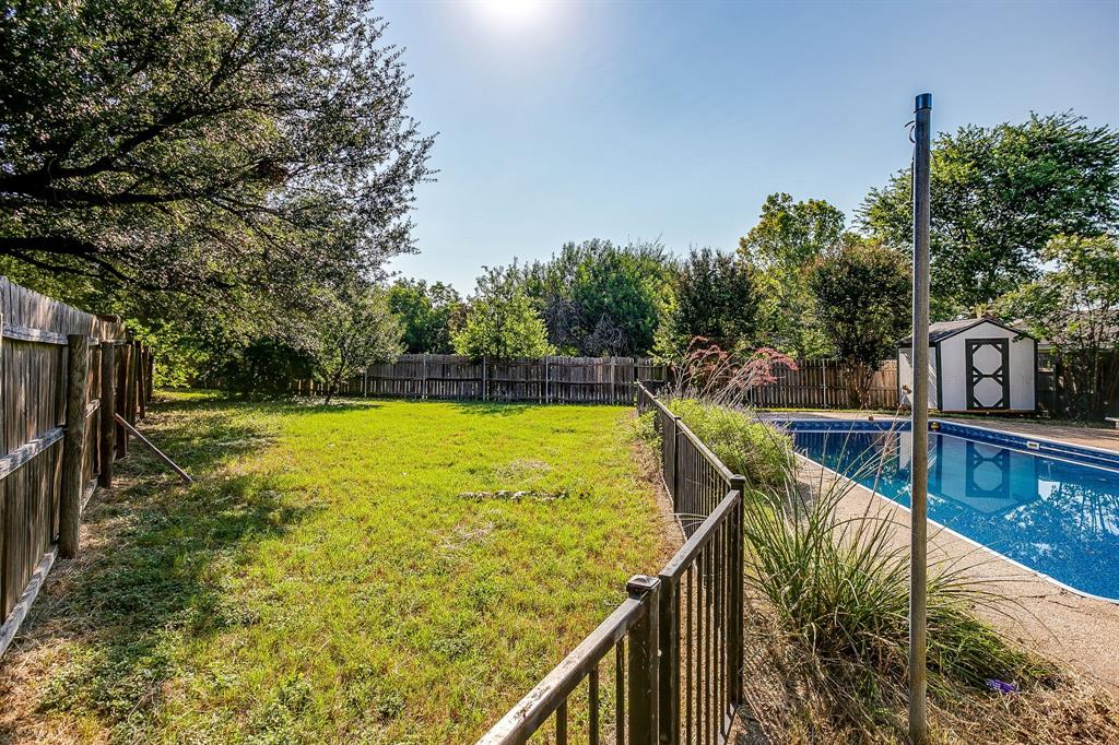 1003 Canton Road Cleburne, TX 76033 - Photo 36 of 40 a view of swimming pool with outdoor seating and yard