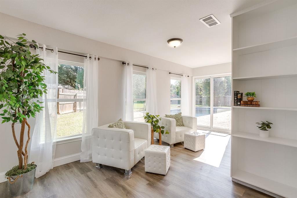 1003 Canton Road Cleburne, TX 76033 - Photo 9 of 40 a living room with furniture and a large window