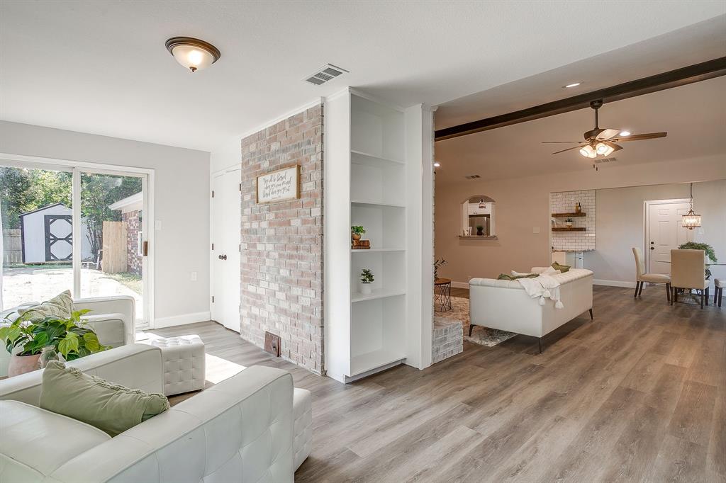 1003 Canton Road Cleburne, TX 76033 - Photo 10 of 40 a living room with furniture and wooden floor