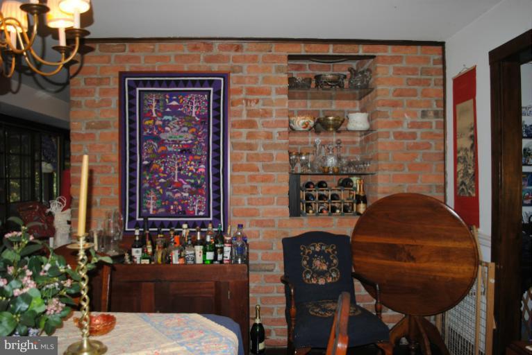 308 Fey Road Chestertown, MD 21620 - Photo 12 of 29 Brick wall in Dining Room