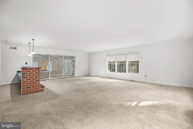 a utility room with sink dryer and washer