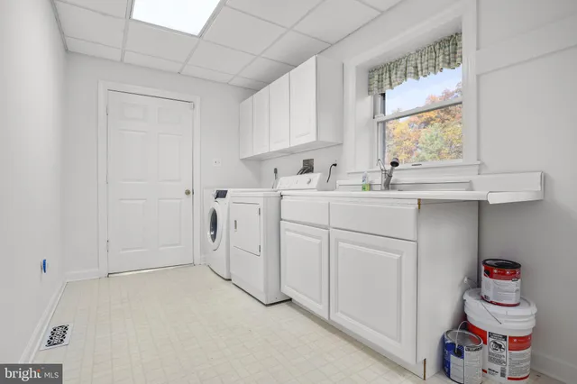 a bathroom with a bathtub and shower curtain