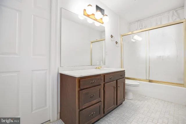 a view of an ocean and trees