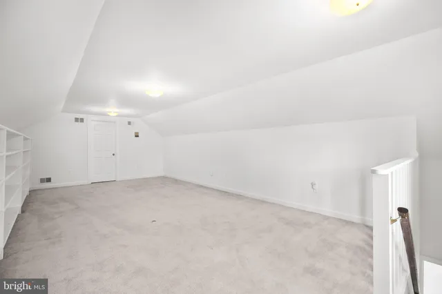 a view of a tree in middle of the green field