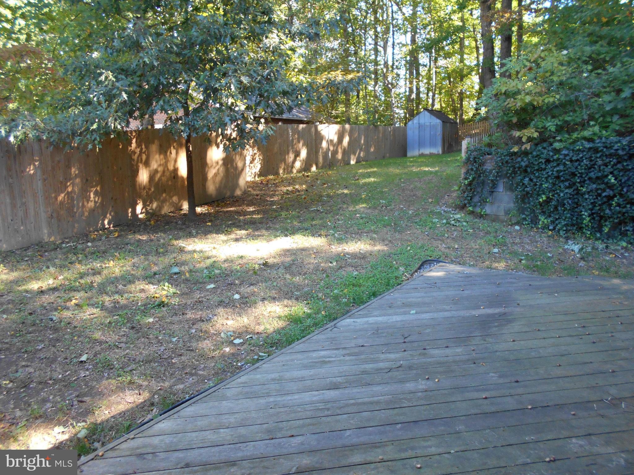 18331 Sharon Road Triangle, VA 22172 - Photo 26 of 30 Another deck and yard