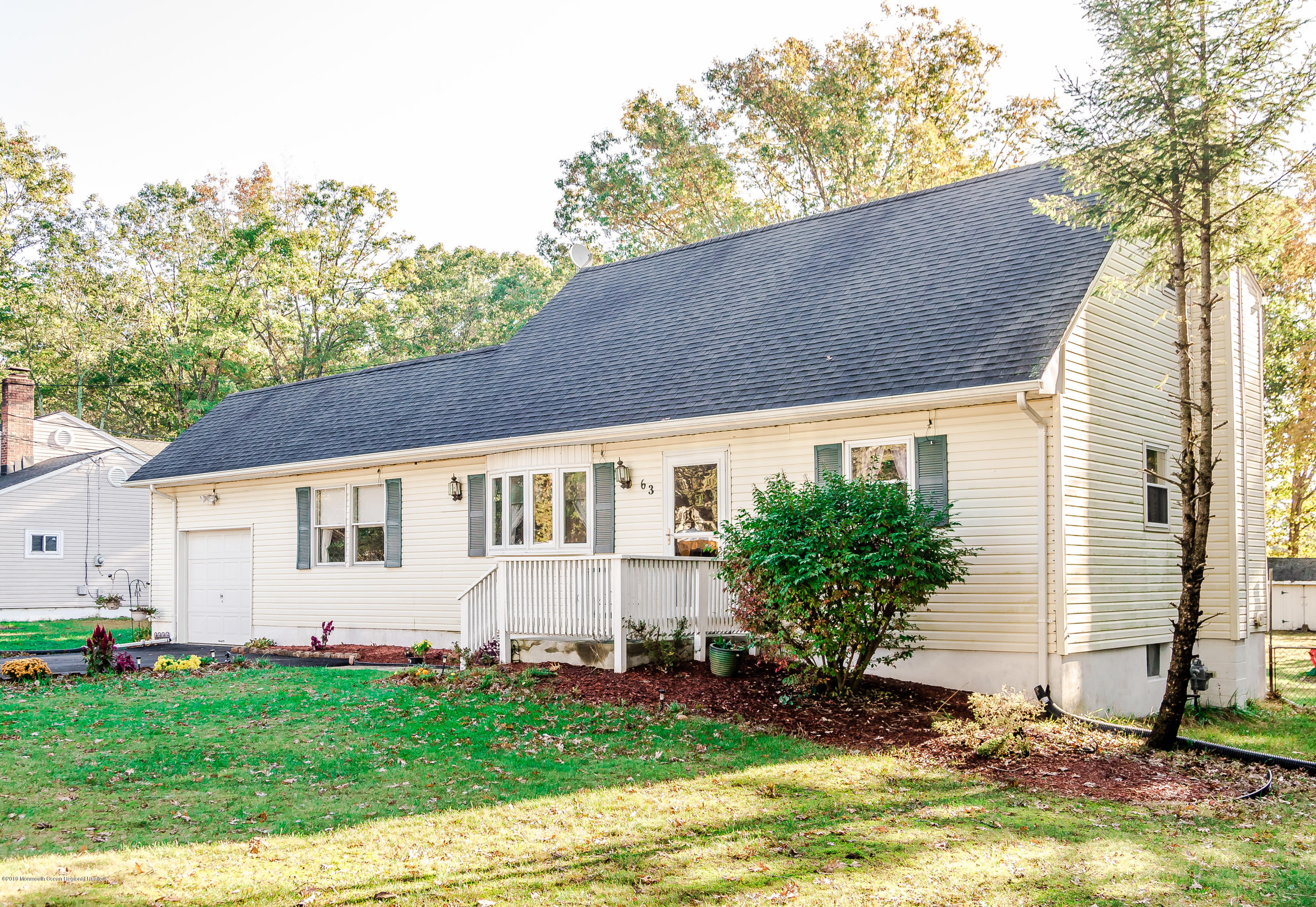 63 Darien Road Howell, NJ 07731 - Photo 2 of 21 a view of a house with backyard