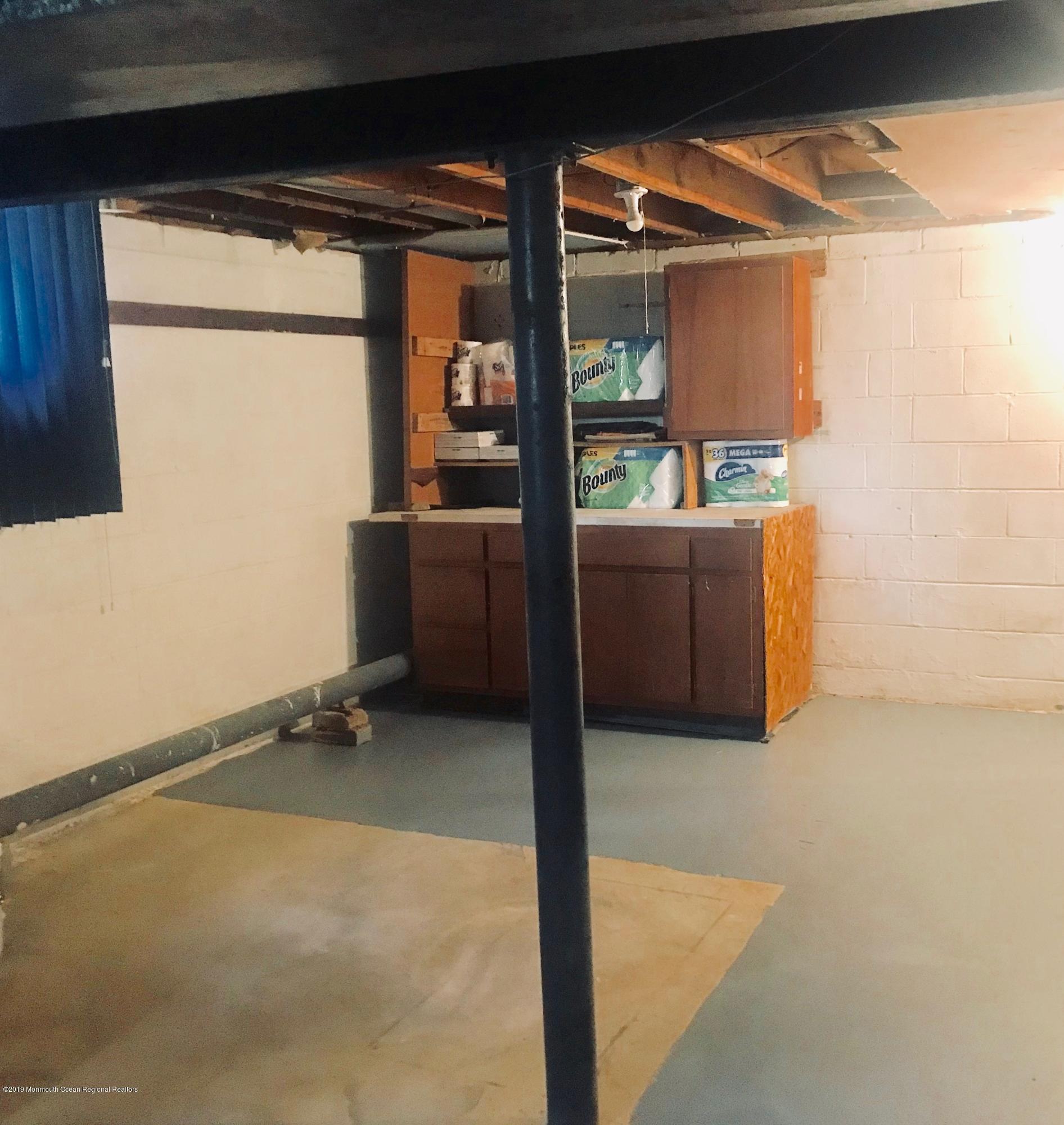 63 Darien Road Howell, NJ 07731 - Photo 16 of 21 a room with furniture and window