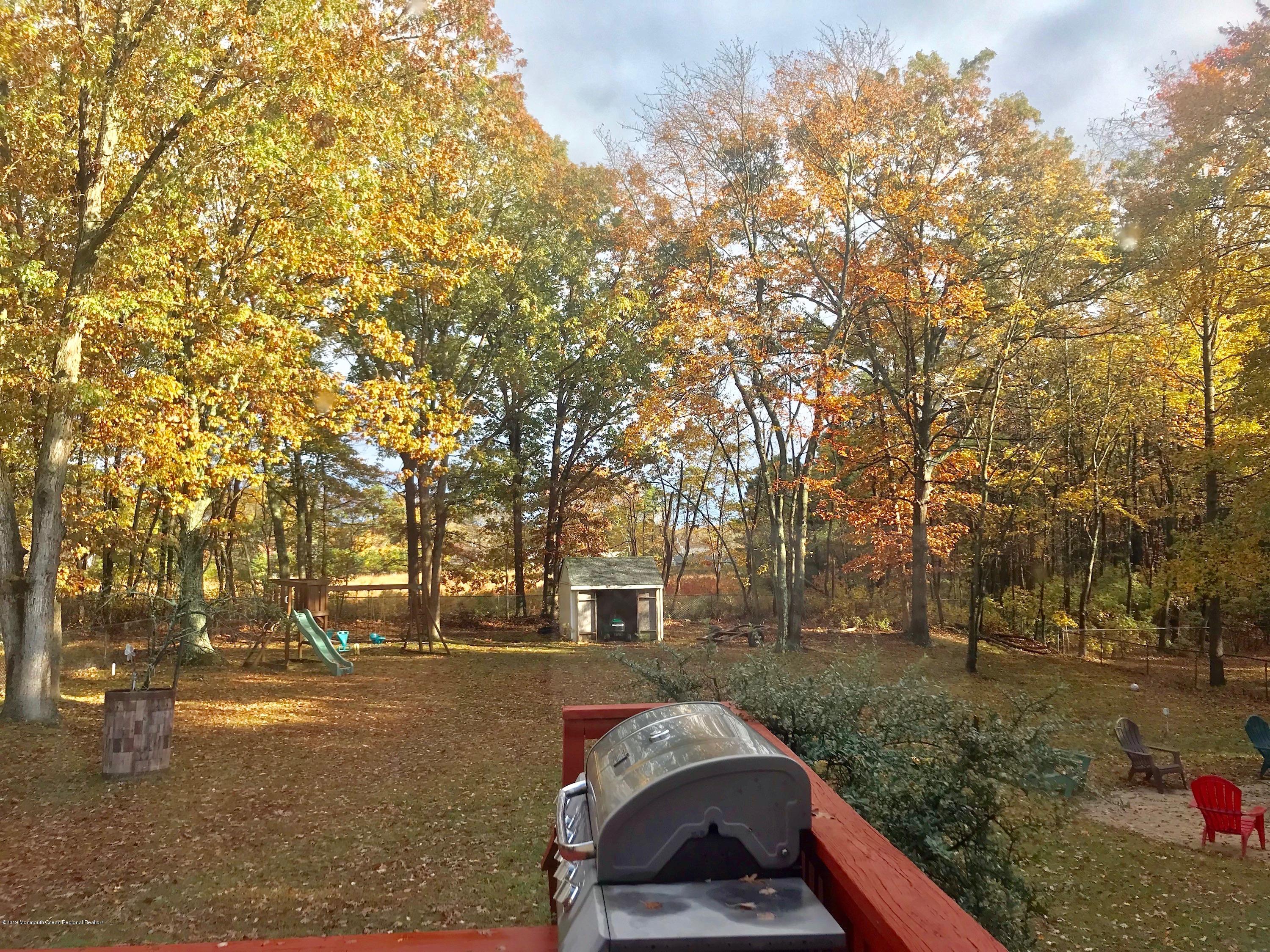 63 Darien Road Howell, NJ 07731 - Photo 18 of 21 a view of outdoor space with seating