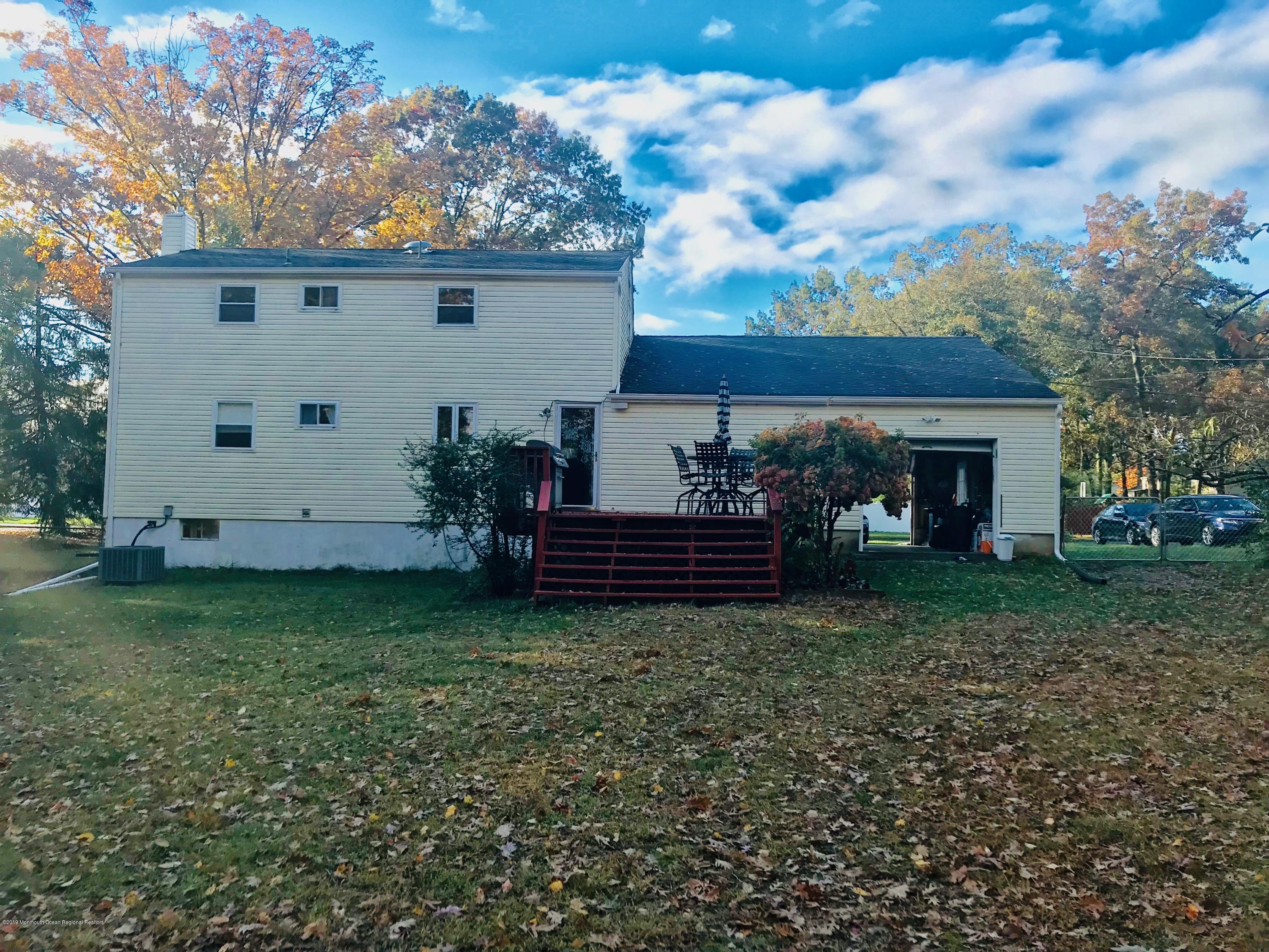 63 Darien Road Howell, NJ 07731 - Photo 21 of 21 a view of a house with backyard and garden
