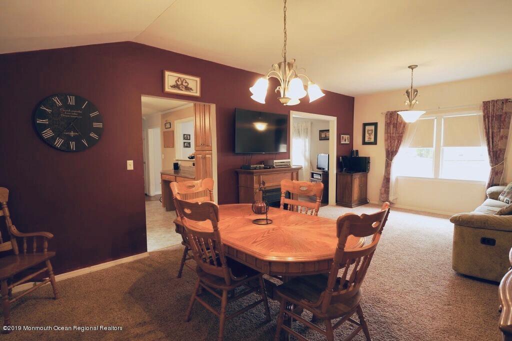 63 Darien Road Howell, NJ 07731 - Photo 5 of 21 a view of a dining room with furniture