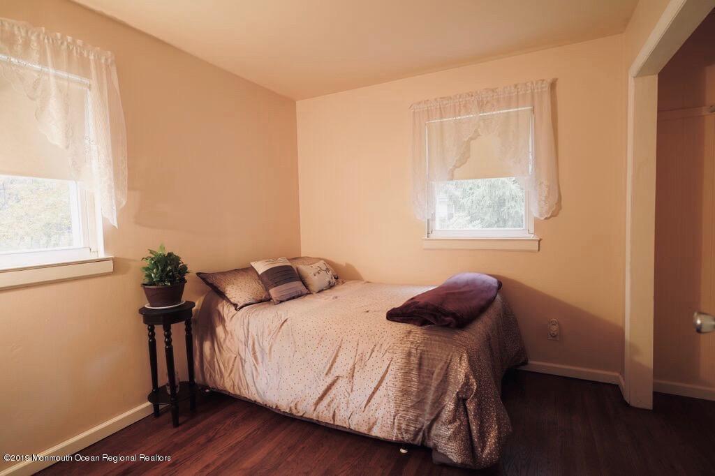 63 Darien Road Howell, NJ 07731 - Photo 7 of 21 a bedroom with a bed and a window