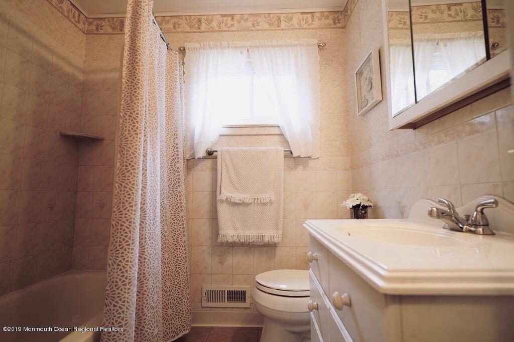 63 Darien Road Howell, NJ 07731 - Photo 9 of 21 a bathroom with a sink toilet and shower
