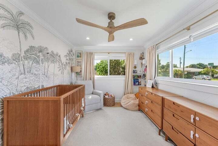499 Northeast 28th Road Boca Raton, FL 33431 - Photo 23 of 52 a bedroom with furniture and window
