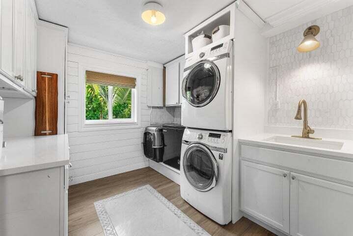 499 Northeast 28th Road Boca Raton, FL 33431 - Photo 32 of 52 a utility room with sink dryer and washer