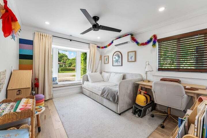 499 Northeast 28th Road Boca Raton, FL 33431 - Photo 33 of 52 a living room with furniture and a window