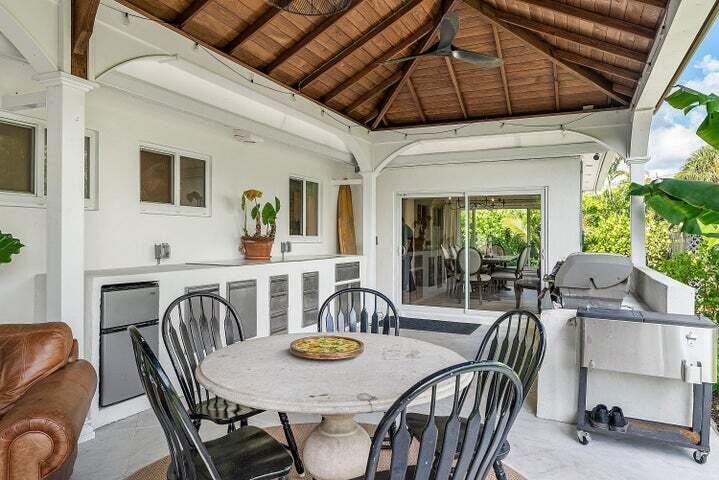499 Northeast 28th Road Boca Raton, FL 33431 - Photo 35 of 52 a view of a dining room with furniture window and wooden floor