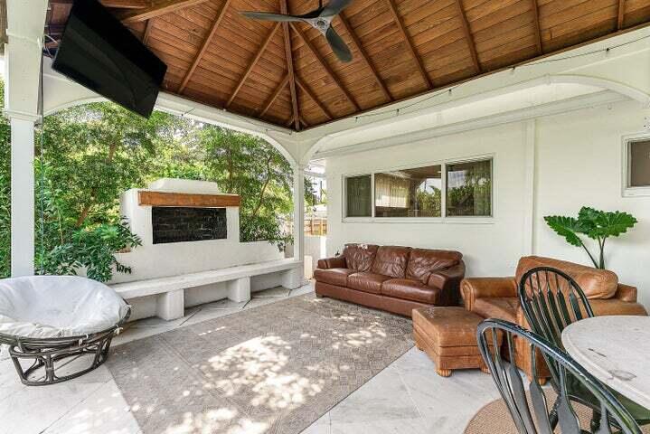 499 Northeast 28th Road Boca Raton, FL 33431 - Photo 36 of 52 a outdoor living space with furniture and garden