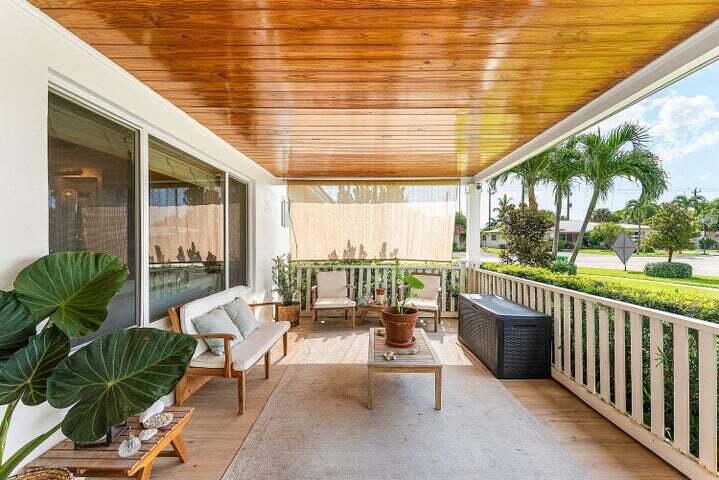 499 Northeast 28th Road Boca Raton, FL 33431 - Photo 5 of 52 a balcony with furniture and a potted plant