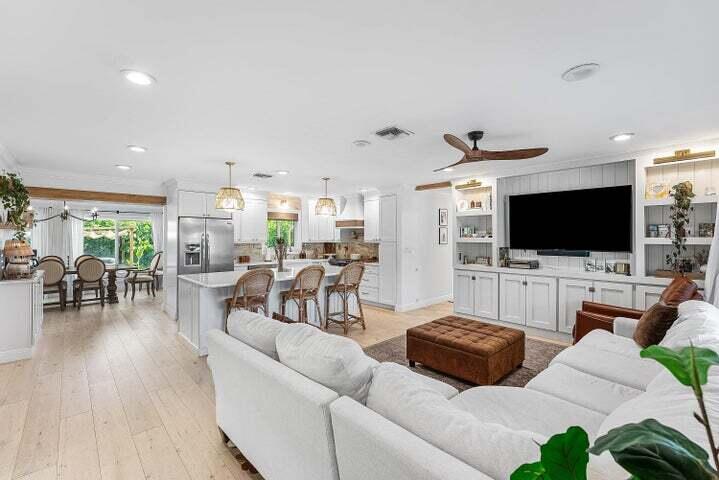499 Northeast 28th Road Boca Raton, FL 33431 - Photo 9 of 52 a living room with furniture and a flat screen tv